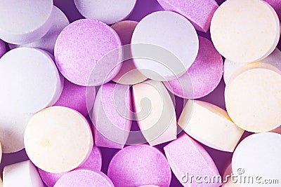 Colorful medicine pills and drugs in close up. Different kinds of multicolored pills. Assorted pills in medicine. Pharmaceutical m Stock Photo