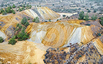 Colorful mine tailings and spoil heaps at abandoned copper mine Stock Photo