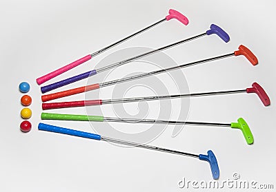 Colorful Mini Golf Clubs and Balls Stock Photo