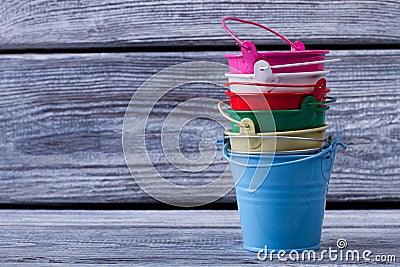 Colorful mini tin pails Stock Photo