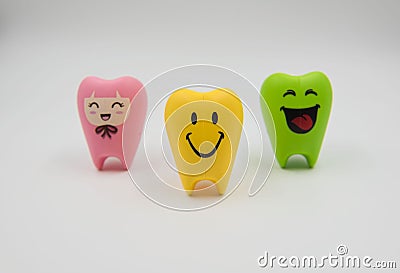 Colorful model Cute toys teeth in dentistry on a white background Stock Photo