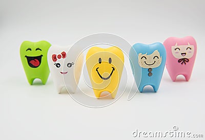 Colorful model Cute toys teeth in dentistry on a white background Stock Photo