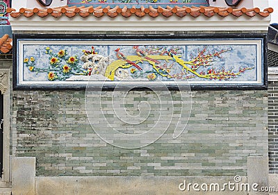 Colorful mosaic and relief in Chinese temple Editorial Stock Photo