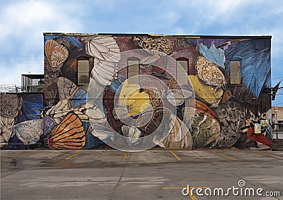 Colorful moth mural on the side of a building in Deep Ellum in Dallas, Texas Editorial Stock Photo