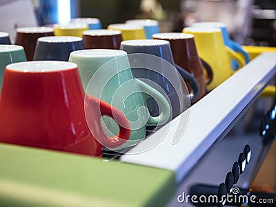 Colorful mugs on Coffee Machine Cafe Restaurant Stock Photo