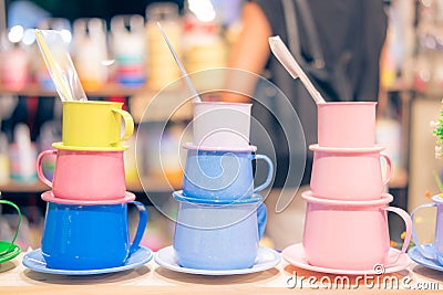 Colorful mugs stainless steel Stock Photo