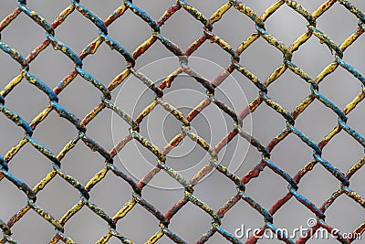 Colorful multicolored metal wire mesh. Stock Photo