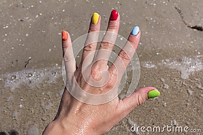 Colorful nail art. Colorful nail polish. the concept of the summer rest Stock Photo