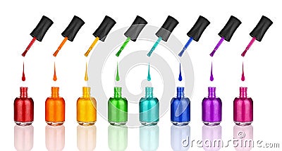 Colorful nail polish glass bottles set, brush, drop & reflection white background isolated closeup, varnish container collection Stock Photo