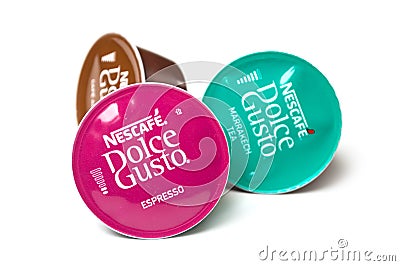 Colorful Nescafe expresso and tea capsules, the famous french brand of coffee dose on white background Editorial Stock Photo