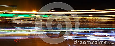 Colorful night lights tracks. Abstract city background. Stock Photo