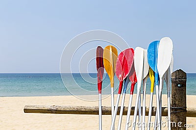 Colorful oars with beach background, water sport, holiday activity at the beac Stock Photo