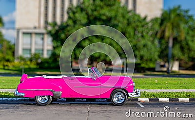 Colorful, old, antique, made over vehicle resembling 1950 American car in Havana, Cuba Stock Photo