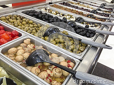 Colorful Olive Variety Buffet in Delicatessen Stock Photo