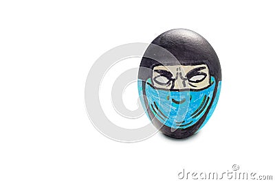 Colorful painted Easter egg fighter ninja warrior in isolated background Stock Photo