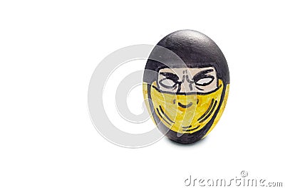 Colorful painted Easter egg fighter ninja warrior in isolated background Stock Photo