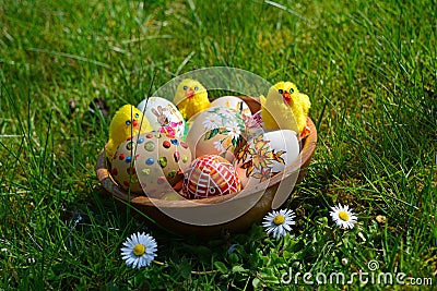 Colorful painted easter eggs on a green grass Stock Photo