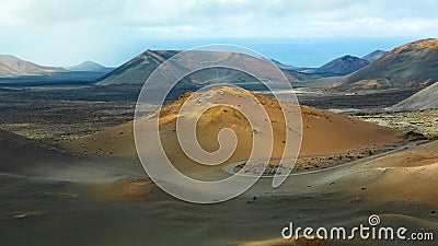 Volcano landscape with big crater in the distance Stock Photo