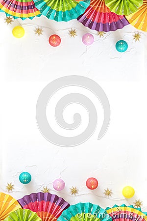 Colorful paper fans, lightening and stars on a white background with place for text Stock Photo