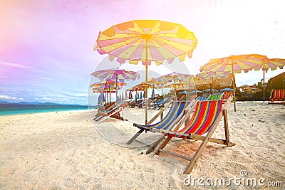 Colorful parasols on a tropical island Stock Photo