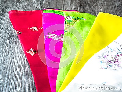 Colorful part of korean dress on wood background Stock Photo