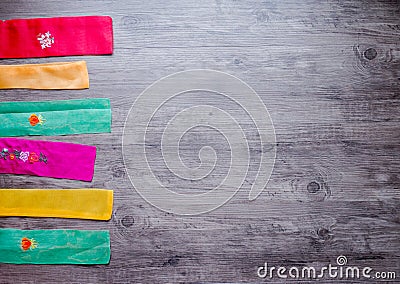 Colorful part of korean dress on wood background Stock Photo