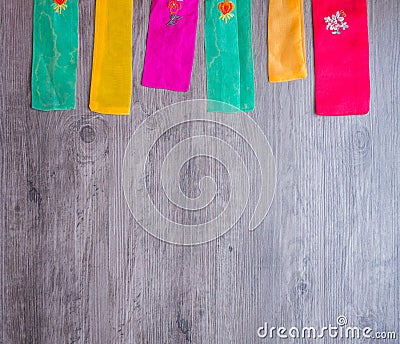 Colorful part of korean dress on wood background Stock Photo