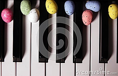 Paschal Easter Eggs and Piano Keys Stock Photo