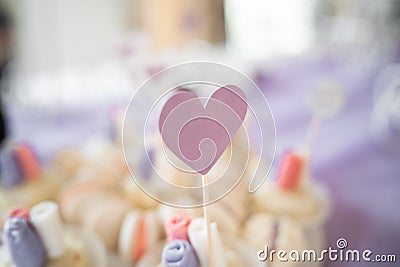 Colorful pastel cake macaron or macaroon on plate. Plate with sweet cakes on pink table. Sweets for the wedding wedding Stock Photo