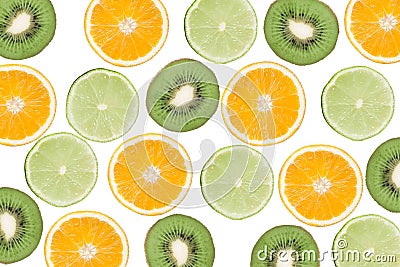 Colorful pattern of kiwi, lime and oranges. Top view of the citrus fruits and sliced kiwi. On white background. Stock Photo