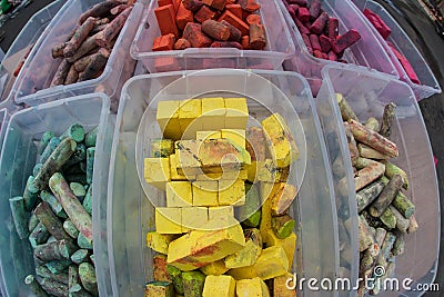 Colorful Pieces Of Chalk Sit In Plastic Containers Stock Photo