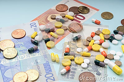 Colorful pills and capsules on dollar banknotes. concept of high cost treatment, preservation of health and medical insurance. Stock Photo