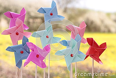 Colorful pinwheels on nature background Stock Photo