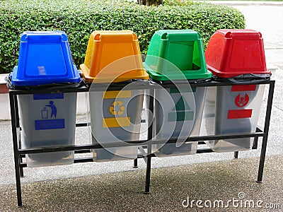 Colorful plastic trash bins / cans for waste separation Stock Photo