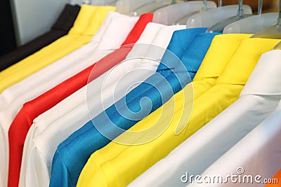 Colorful polo shirt on a hanger Stock Photo