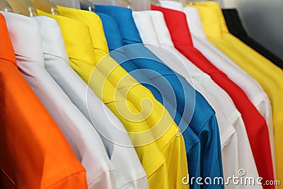 colorful polo shirt on a hanger Stock Photo