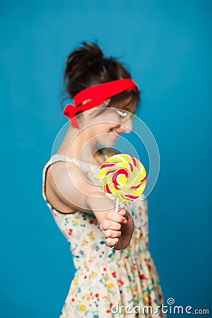 Colorful portrait young funny fashion girl posing on blue Stock Photo