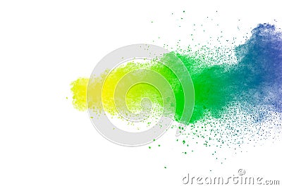 Colorful powder explosion on white background.Abstract blue yellow green color dust particles splash Stock Photo