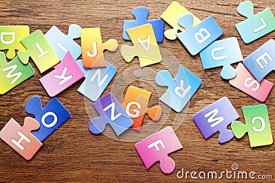 Colorful puzzle letters background Stock Photo