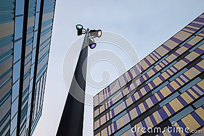 Colorful quirky building exteriors and matching colourful Street lamp Belgium Stock Photo