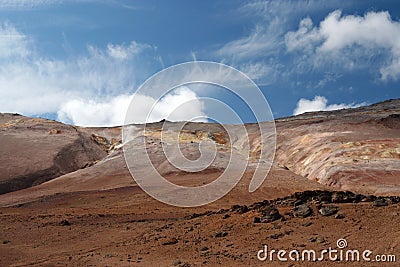 Colorful red barren dry landscape under blue sky, Kerlingarfjoll in Iceland Stock Photo