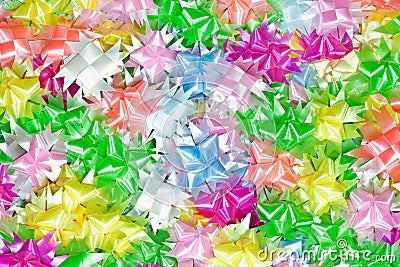 The colorful ribbons weave in flower form. Stock Photo