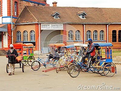 Madagascar Colorful Rickshaws at post office Antsirabe Editorial Stock Photo