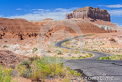 Colorful road in desert painted with different color sediments and rocks near Goblin Valley State Park Utah USA Stock Photo