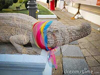 A colorful rock crocodile sculpture Stock Photo