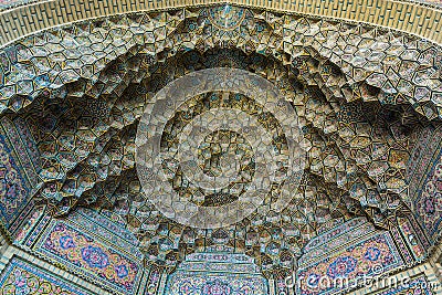 Colorful and rosy mosaic patterns on the ceiling of Nasir Al-Mulk Mosque Pink Mosque in Shiraz, Iran Stock Photo
