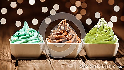 Colorful row of frozen yogurt desserts at a party Stock Photo