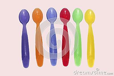 colorful rubber baby spoon Stock Photo