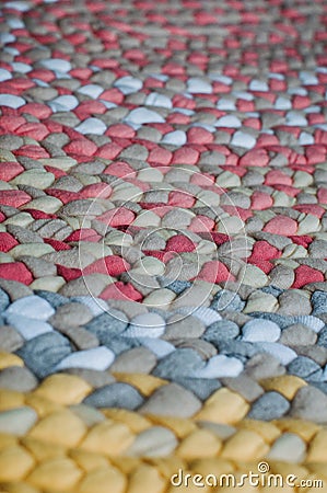 Colorful rug from braids Stock Photo