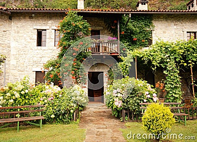 Colorful rural house with garden Stock Photo